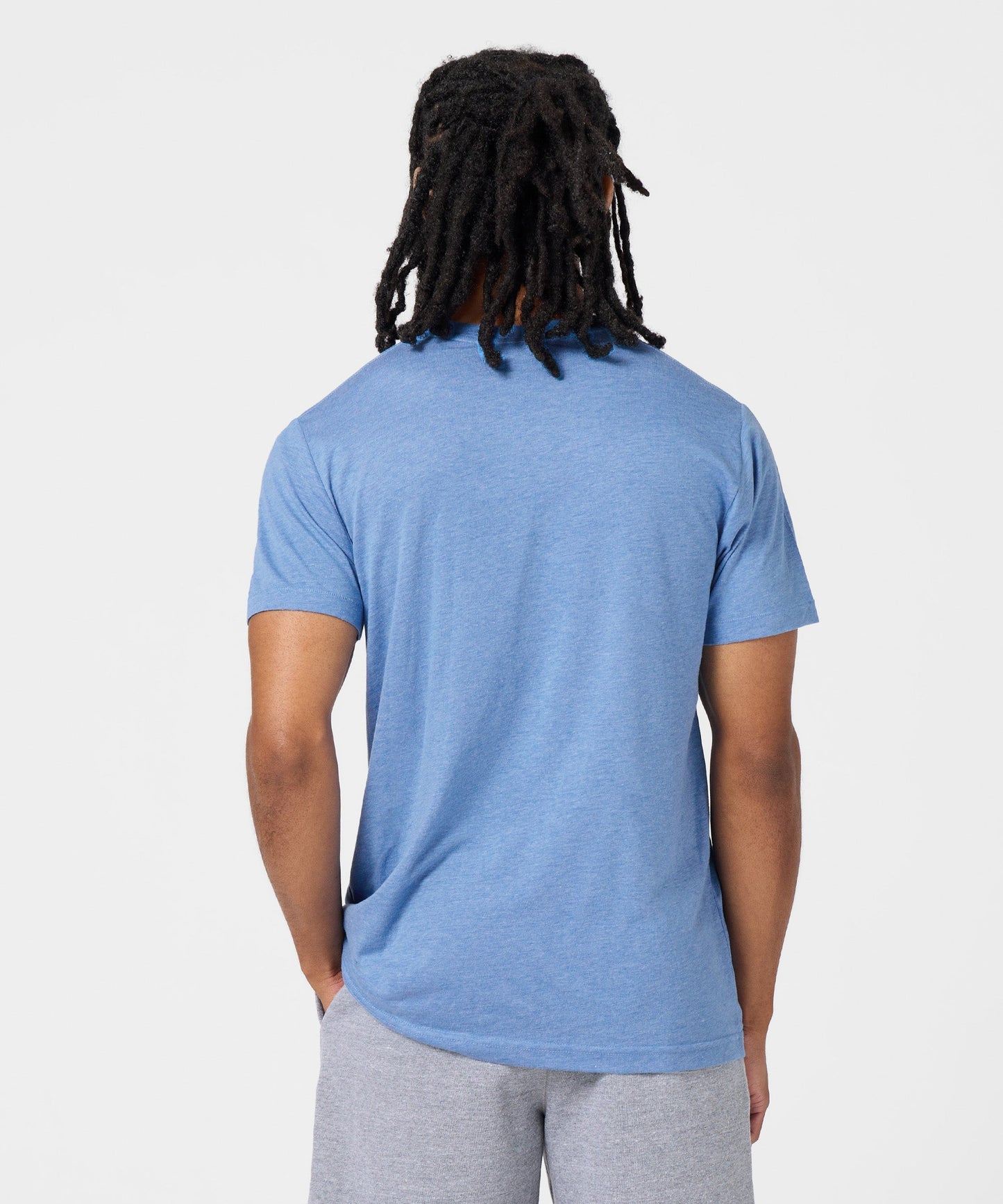 Detailed view of the HOMAGE brand collar tag inside the neckline