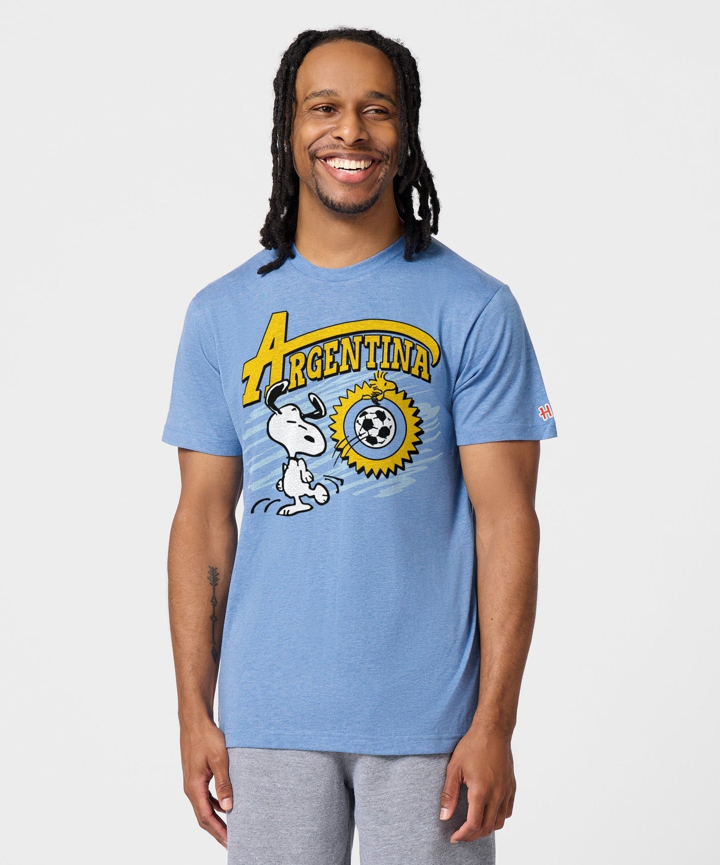 Back view of the light blue t-shirt showing a plain solid back