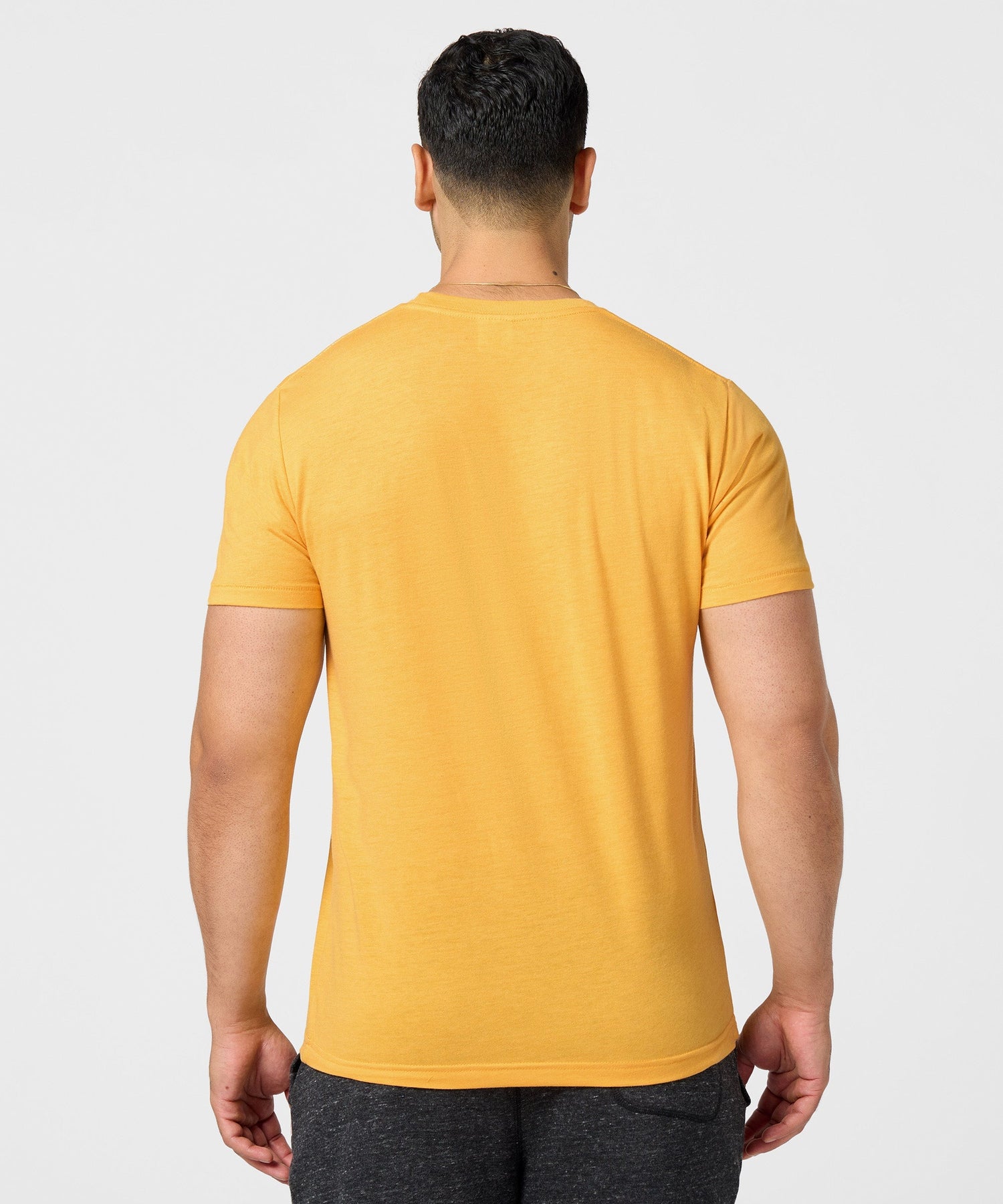 Close-up of the ultra-soft tri-blend fabric texture and collar detail
