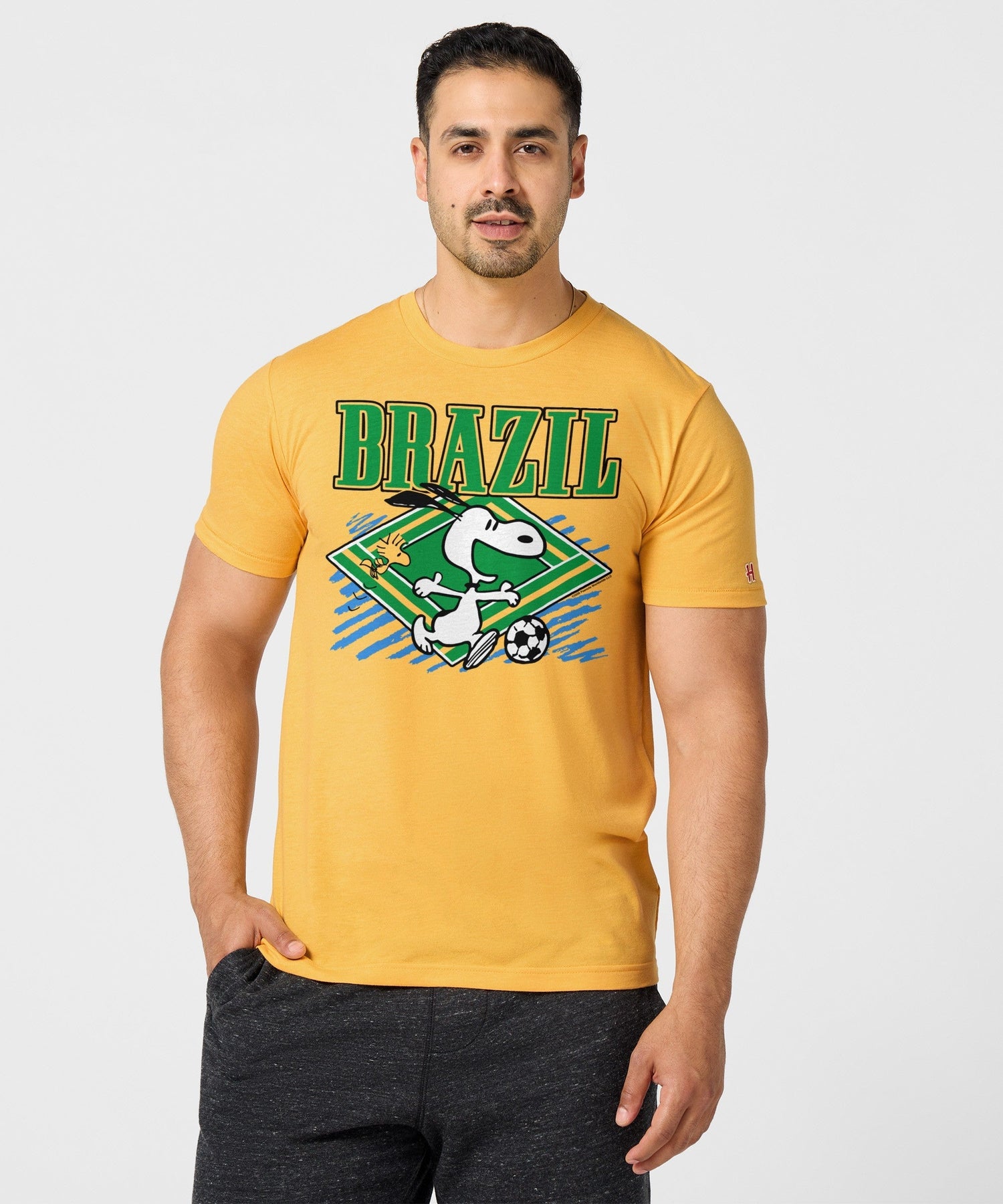 Back view of the gold t-shirt, solid color with a clean finish