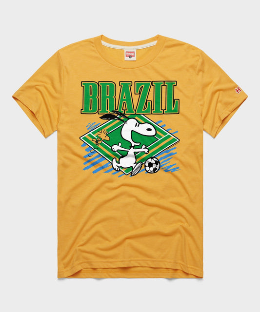 Gold tri-blend t-shirt featuring Snoopy playing soccer in Brazil team colors centered on the front-0