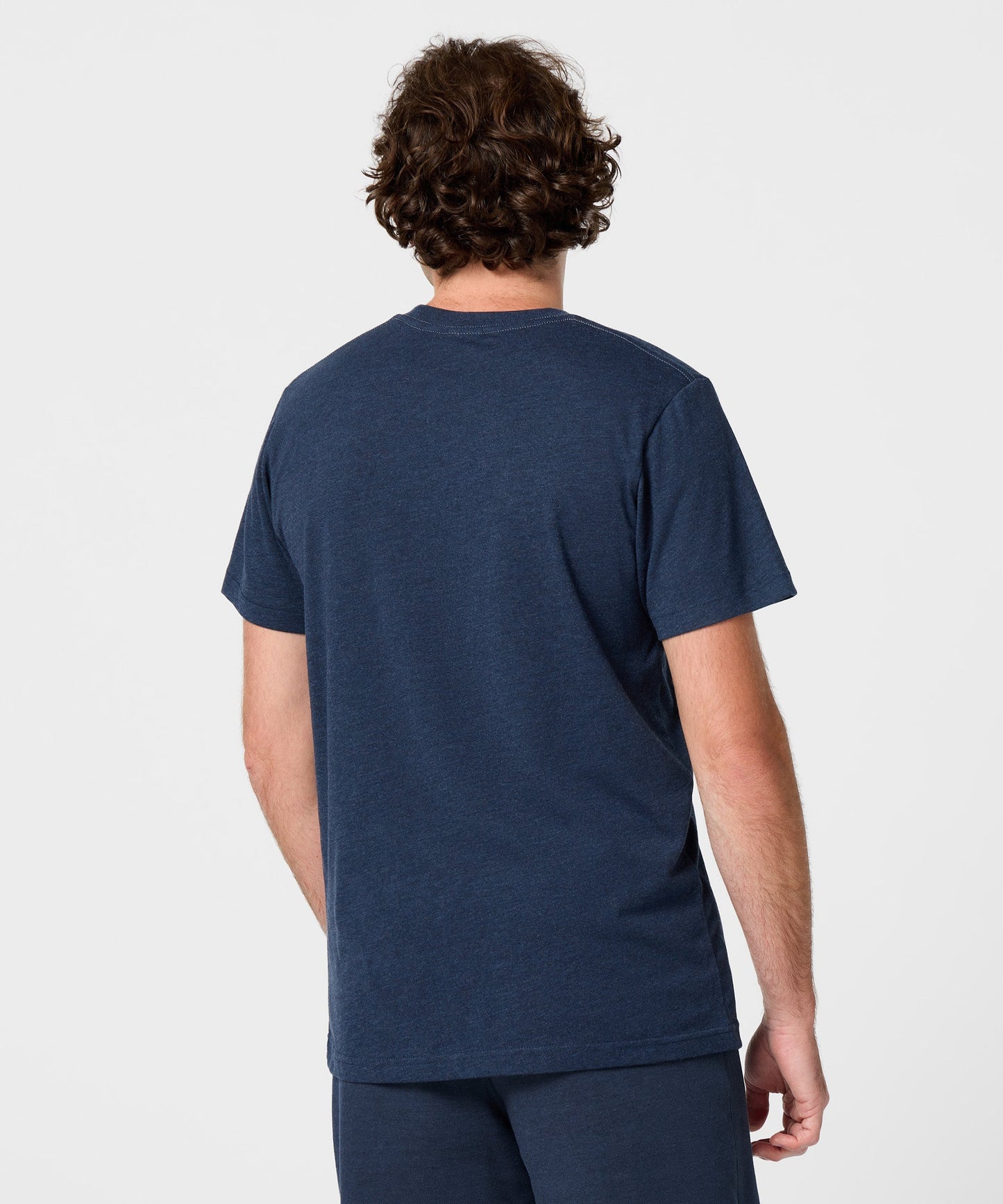 Detailed view of the fabric texture and collar construction on the t-shirt