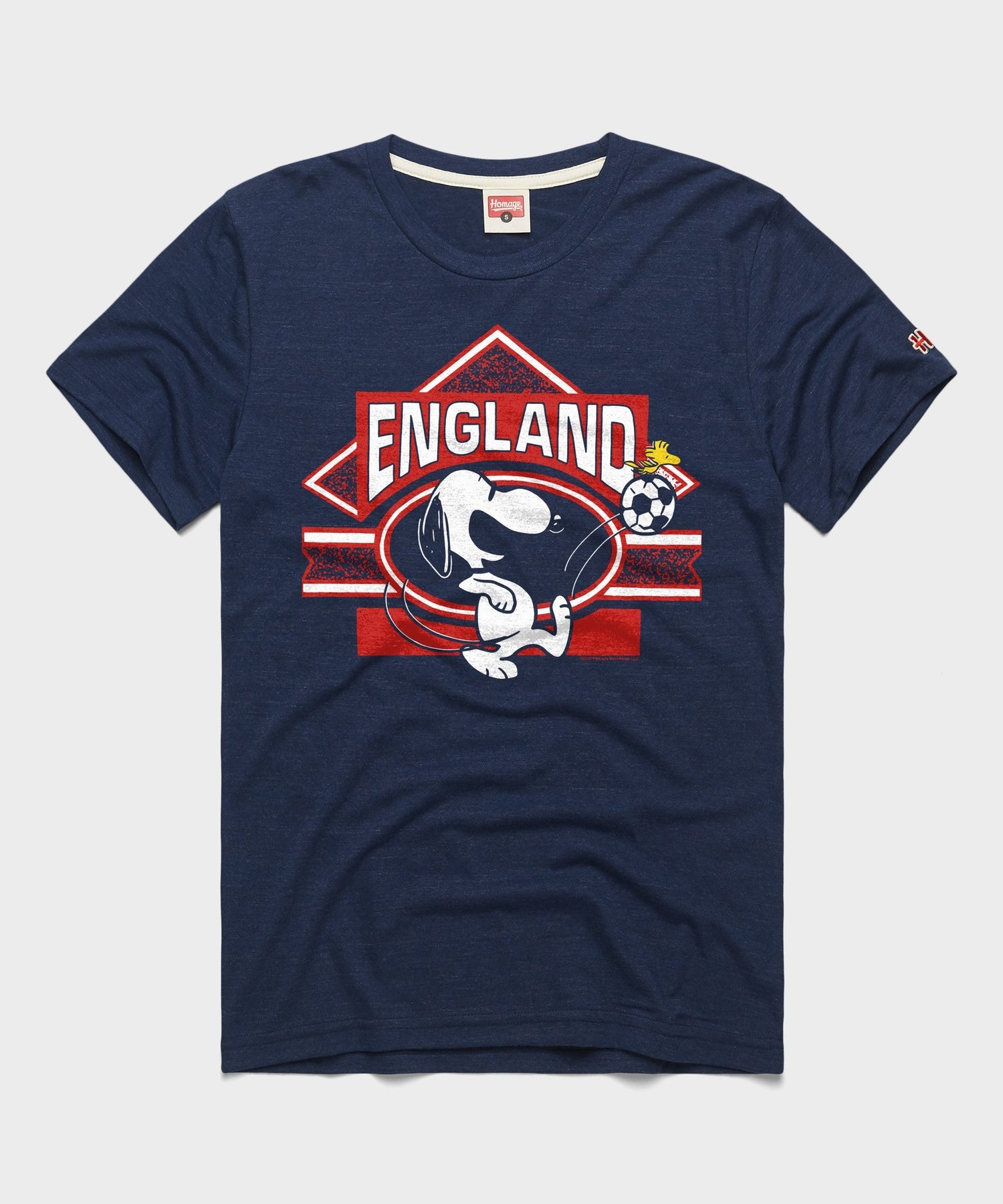 Navy blue t-shirt featuring Snoopy playing soccer in an England kit on the front chest