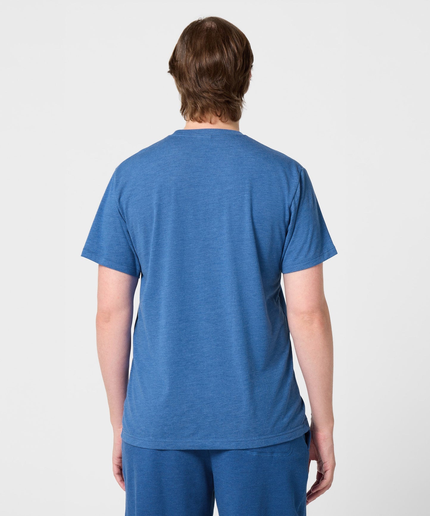 Close-up of the fabric texture and collar detail on the HOMAGE Peanuts t-shirt