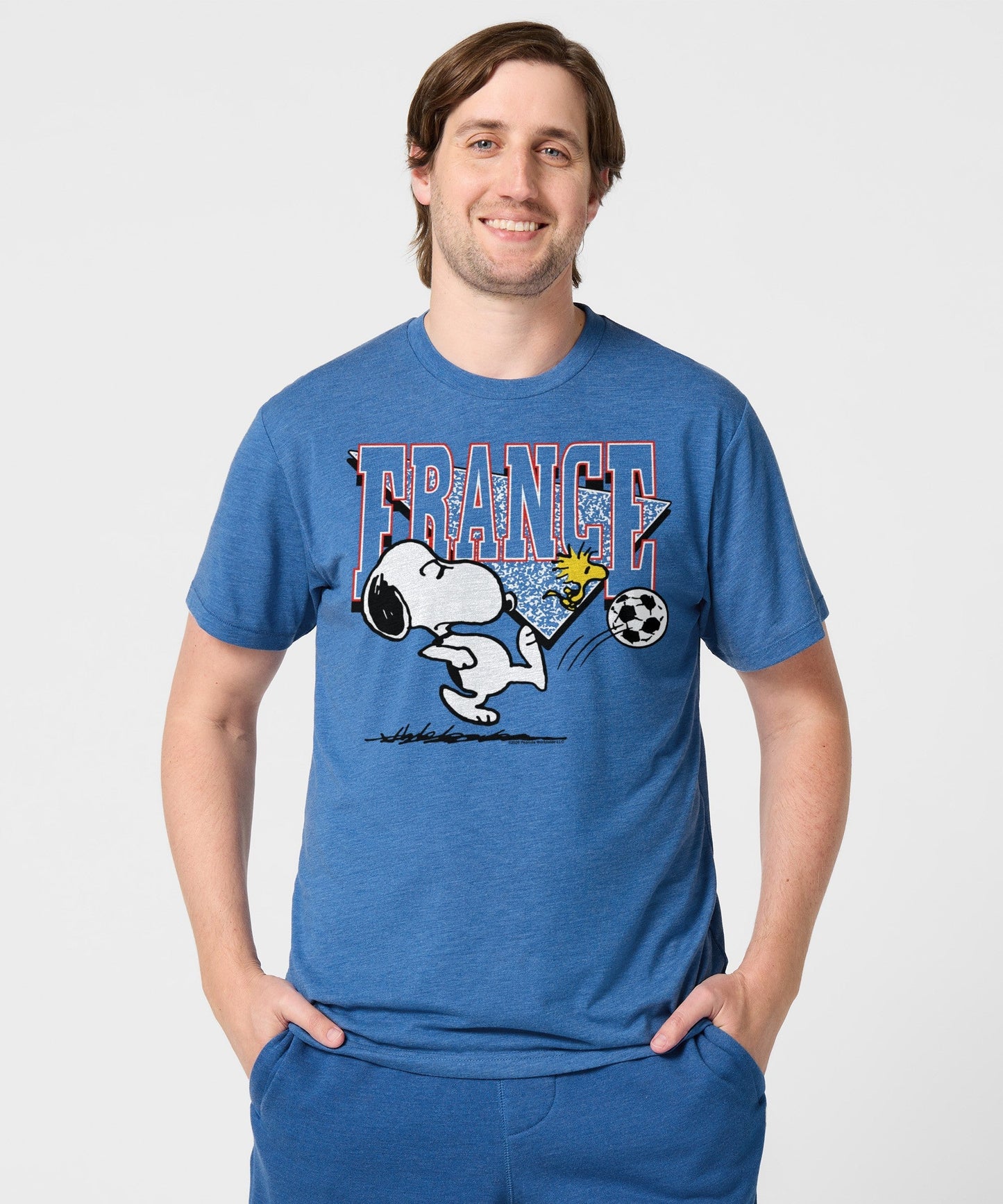 Back view of the royal blue tri-blend t-shirt, plain solid back