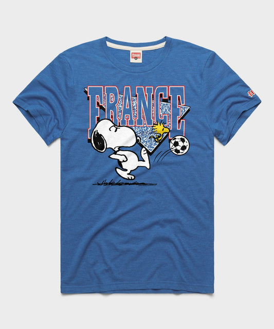HOMAGE x Peanuts Snoopy and France soccer t-shirt, royal blue front view featuring Snoopy playing soccer-0