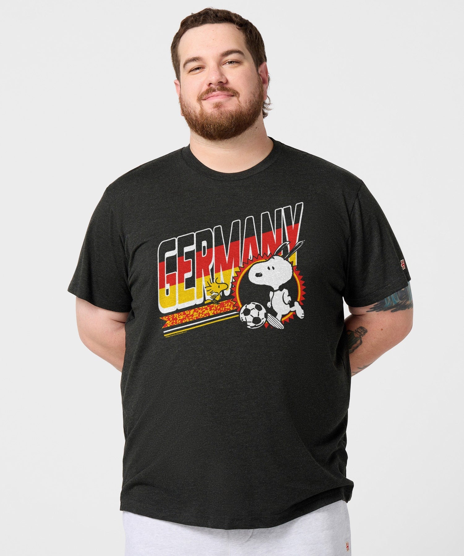 Back view of the charcoal t-shirt, solid color with a plain back