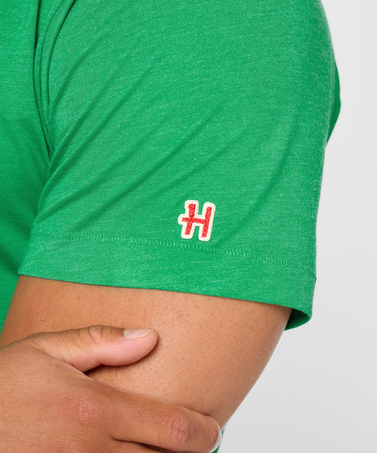 Green tri-blend t-shirt featuring Snoopy playing soccer for the Mexico national team on the front chest-4