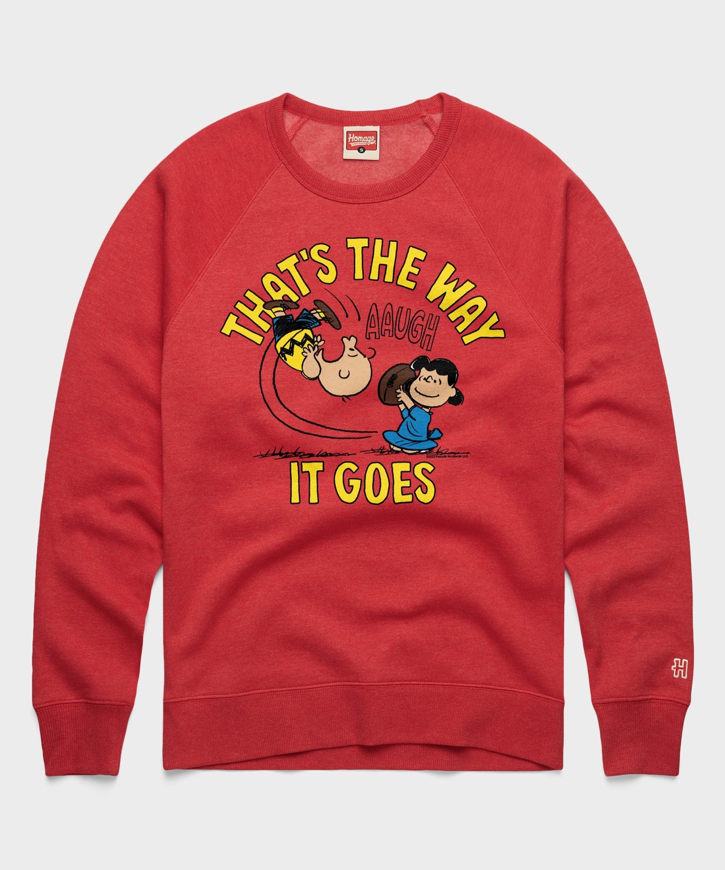 Red crewneck sweatshirt featuring Charlie Brown and That's The Way It Goes graphic on the front chest