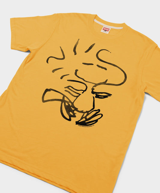 Gold HOMAGE t-shirt featuring a graphic of Woodstock from Peanuts centered on the front-1