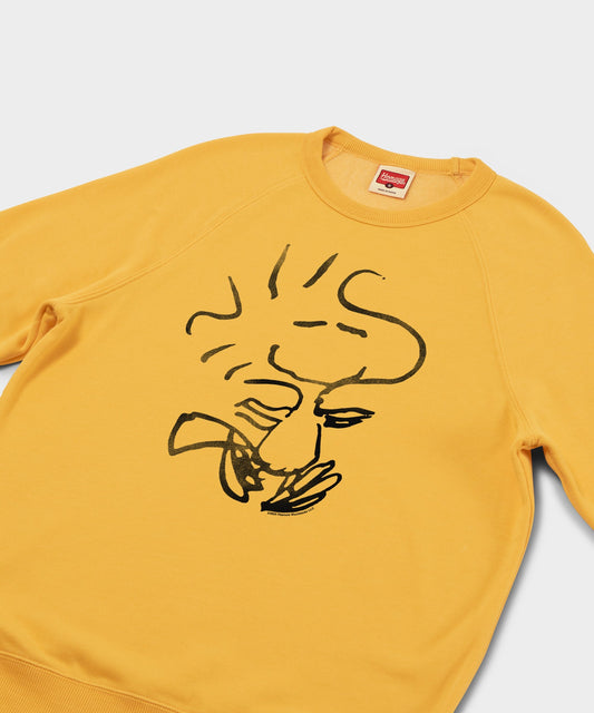 Gold crewneck sweatshirt featuring Woodstock centered on the front chest-1
