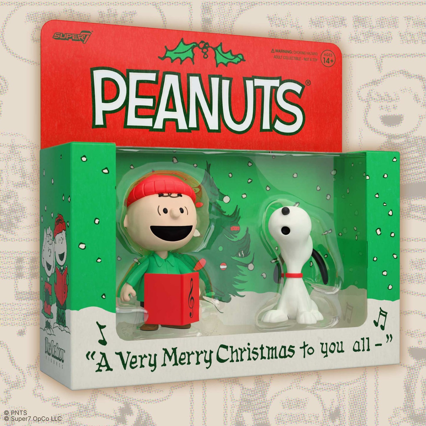 Close up of Charlie Brown caroling figure with blue winter hat and songbook