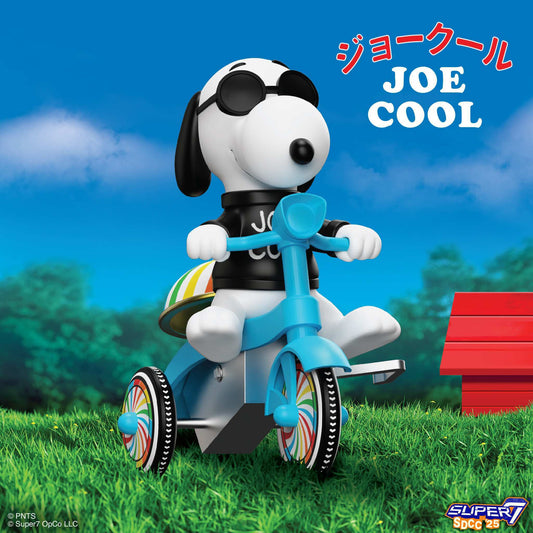 Snoopy as Joe Cool on a blue tricycle with a black shirt and sunglasses.-4