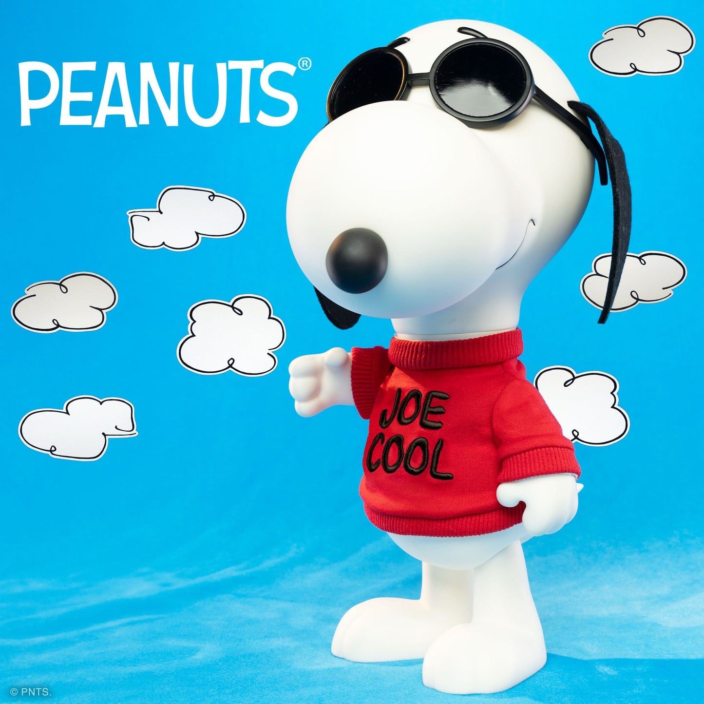 Poseable Joe Cool Snoopy figure with removable red fabric sweater