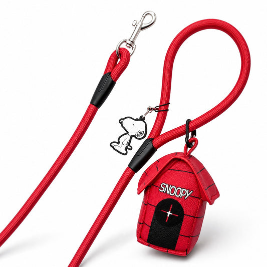 Red rope dog leash with a Snoopy doghouse shaped waste bag dispenser attached.-1