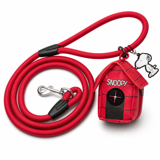 Red rope dog leash with a Snoopy doghouse shaped waste bag dispenser attached.-0