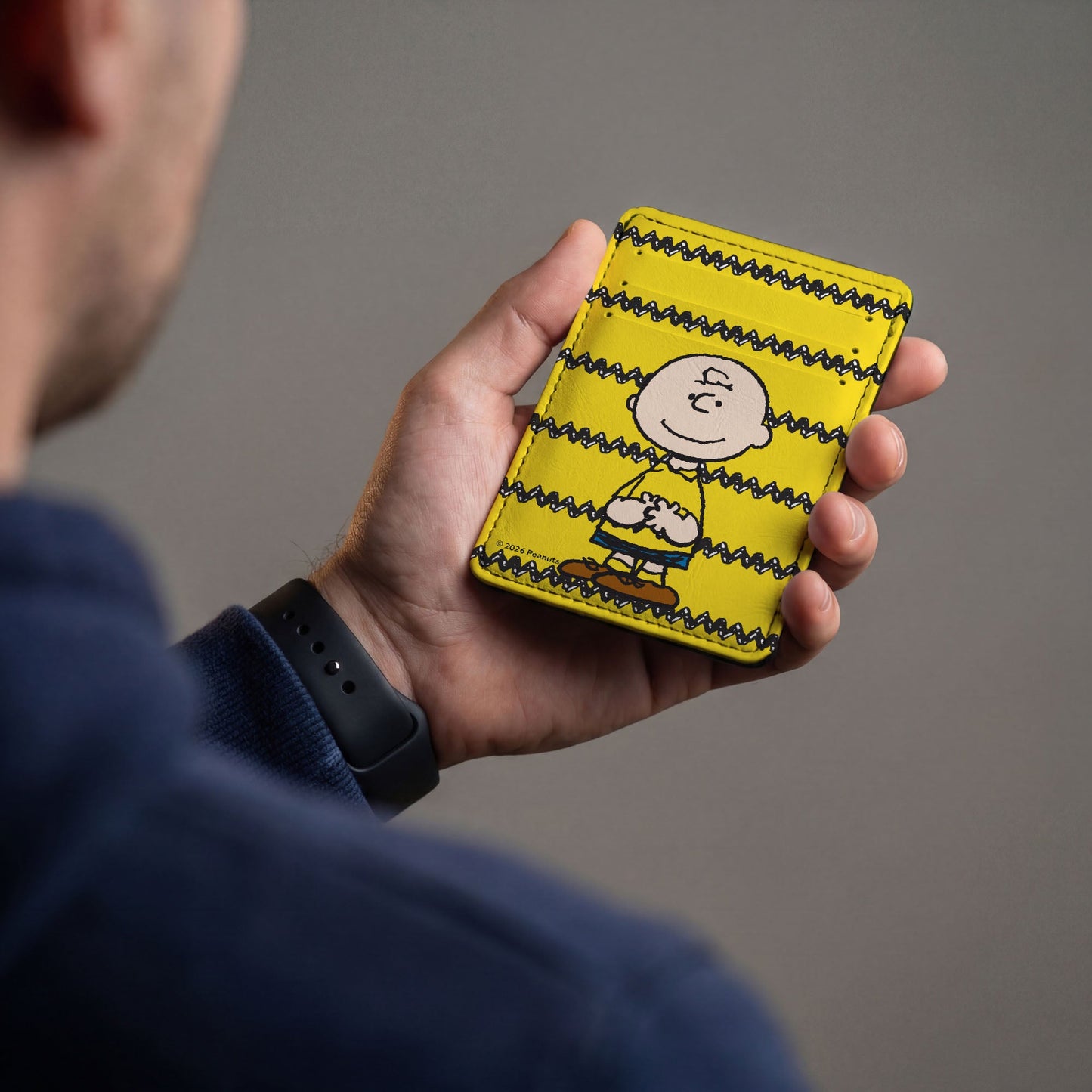 Side view of the slim Buckle-Down wallet illustrating the card slots and bill compartment.