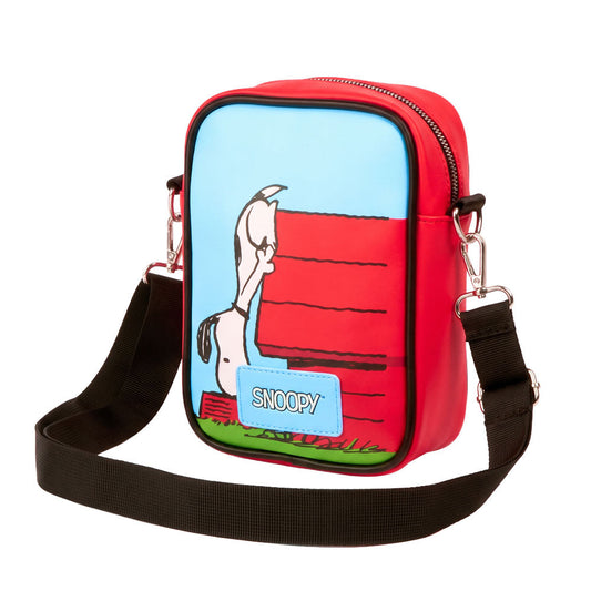 Light blue vegan leather crossbody bag featuring Snoopy relaxing on his red doghouse in various poses-3