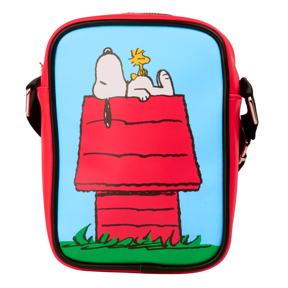 Light blue vegan leather crossbody bag featuring Snoopy relaxing on his red doghouse in various poses