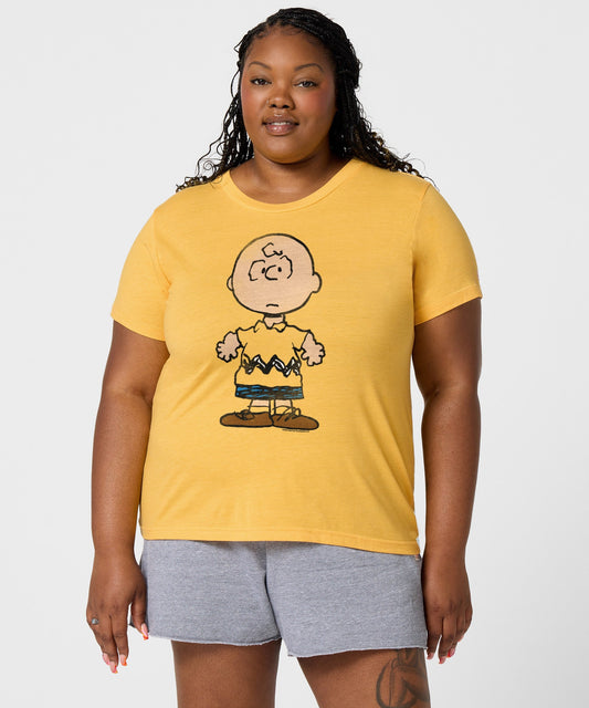 Gold women's t-shirt featuring a vintage graphic of Charlie Brown centered on the front-2