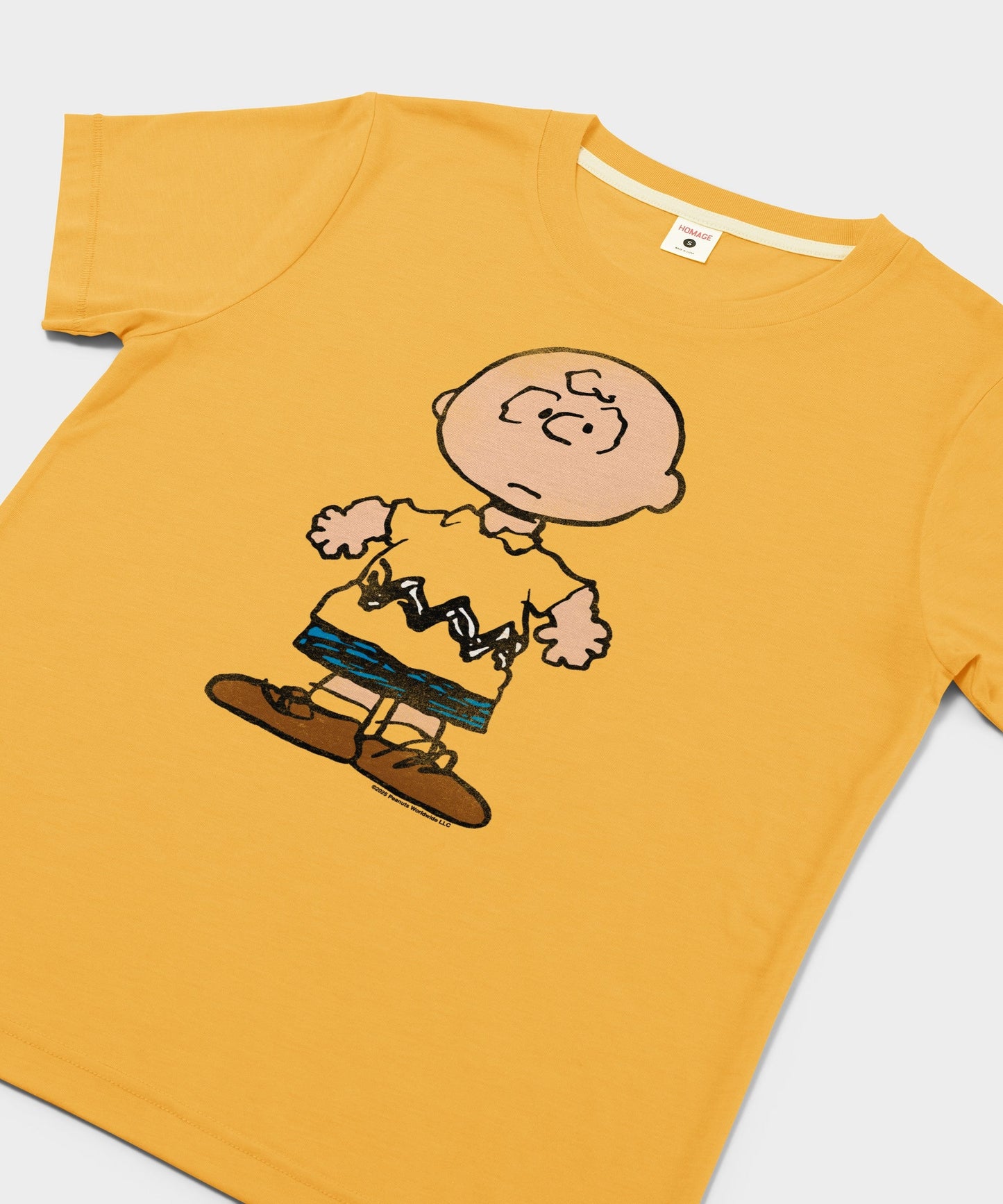 Close-up of the Charlie Brown graphic printed on the front chest
