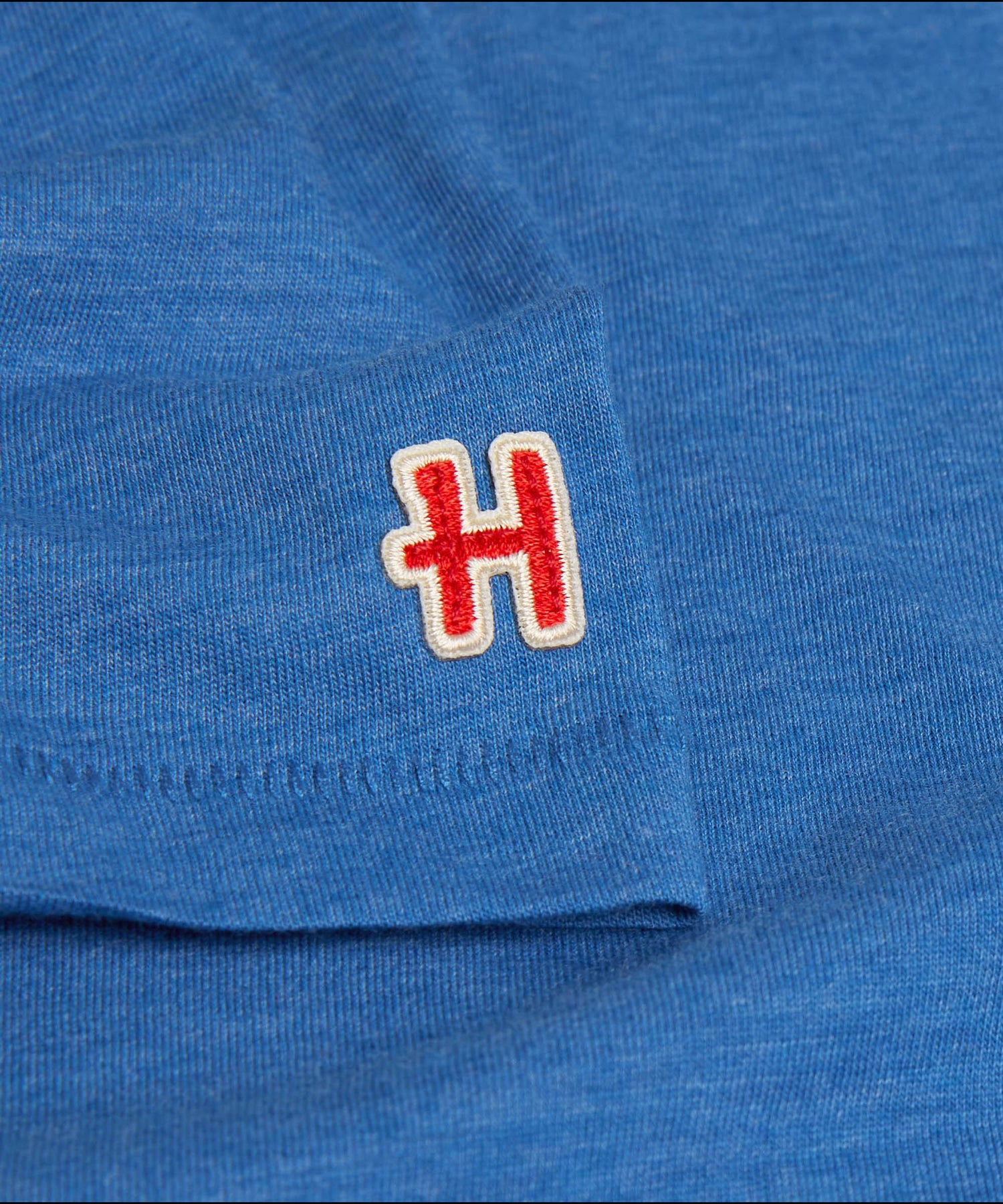 Interior collar view displaying official Peanuts and HOMAGE branding tags