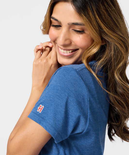 Royal blue women's t-shirt featuring a graphic of Franklin from Peanuts centered on the front-4