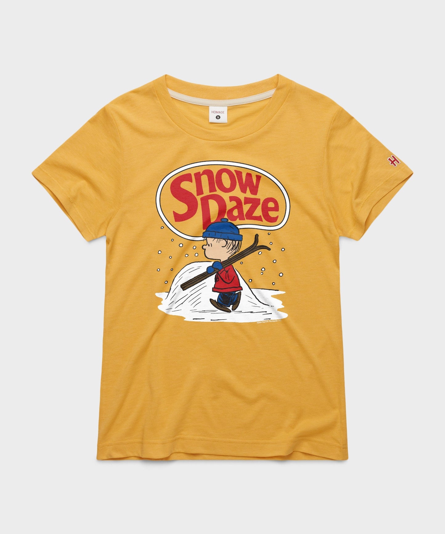 Gold crewneck sweatshirt featuring Linus holding his blue blanket amidst falling snowflakes on the front chest