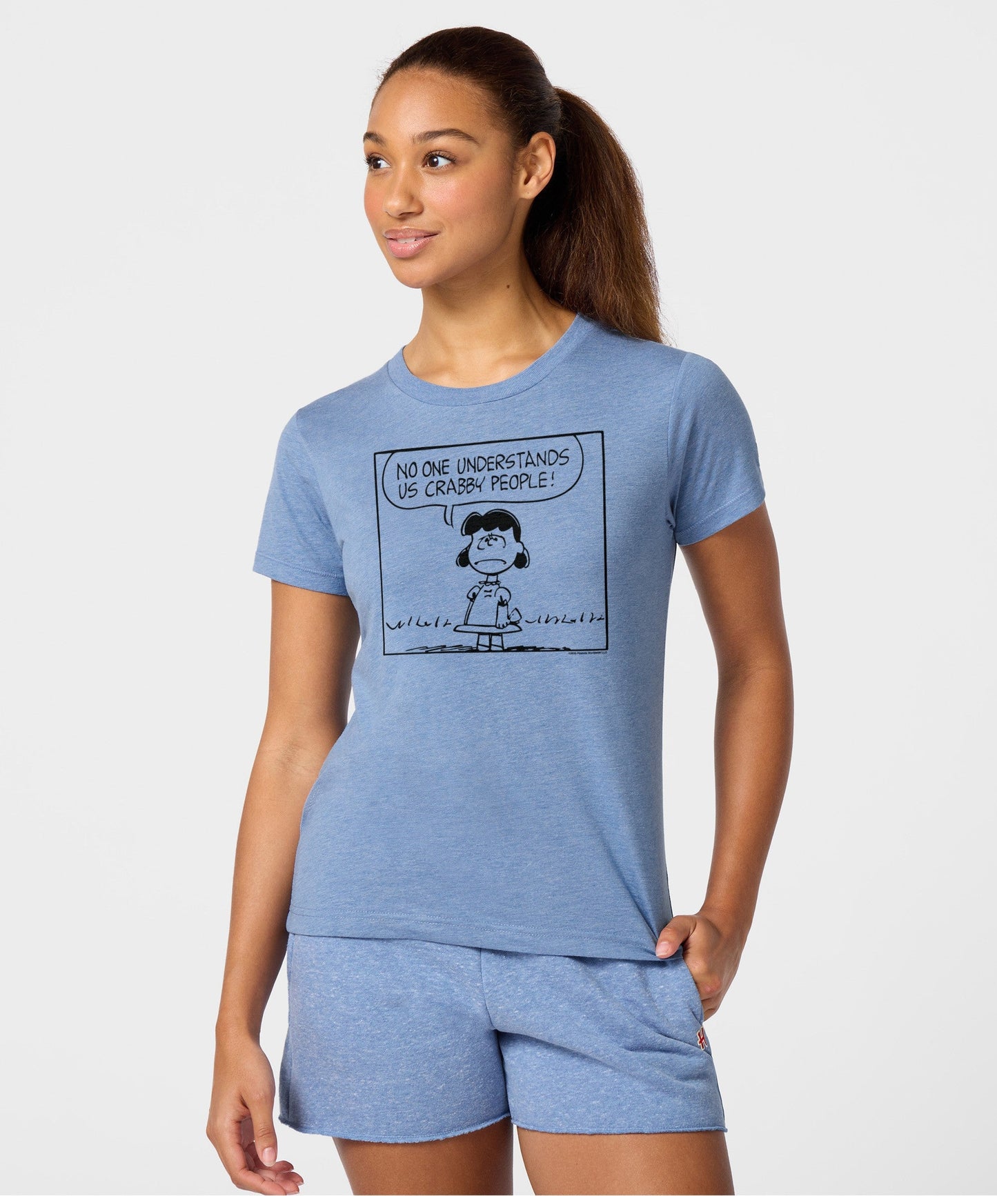 Back view of the light blue t-shirt showing a plain, solid fabric finish