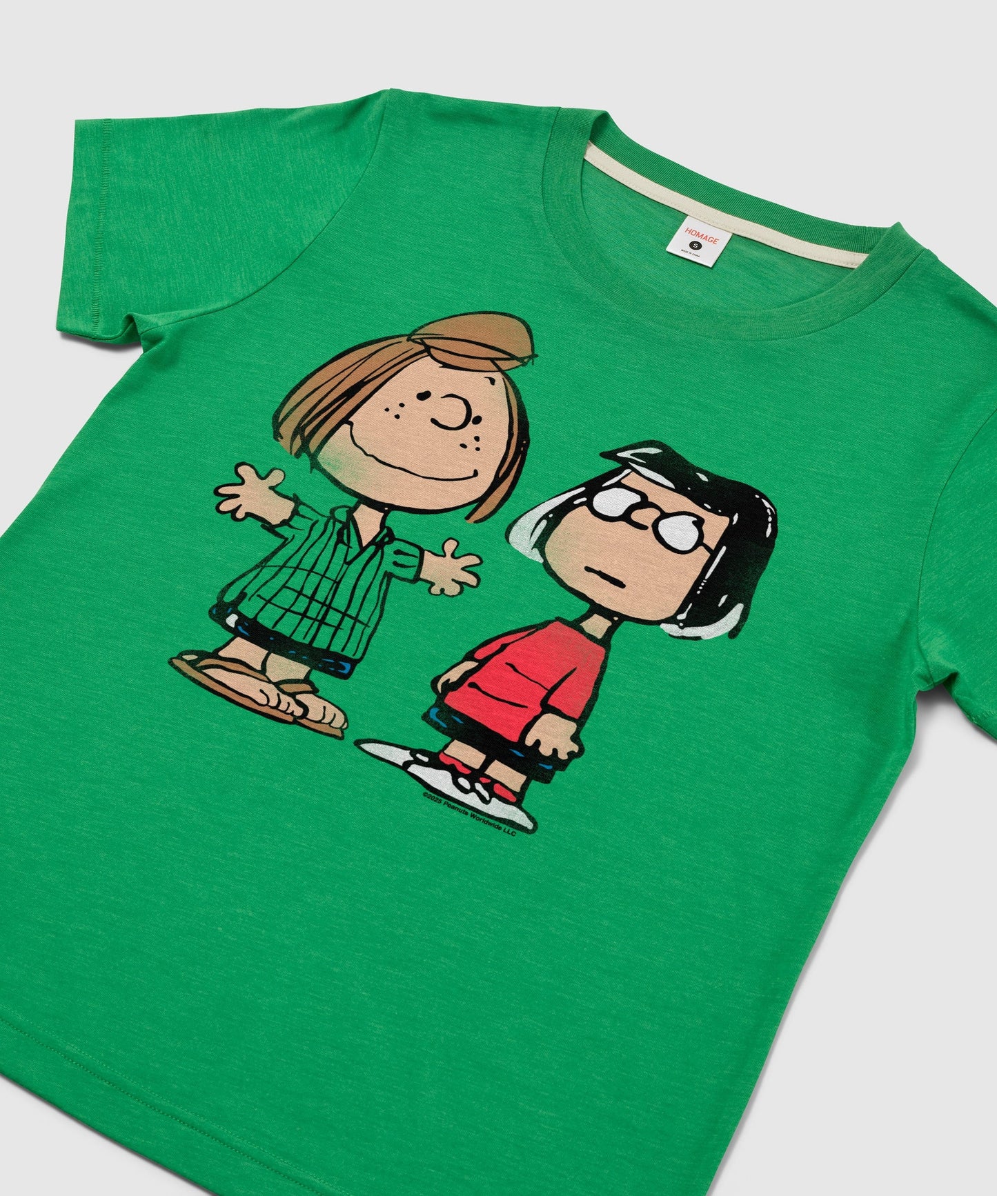Close-up of the Peppermint Patty and Marcie graphic illustration on the front