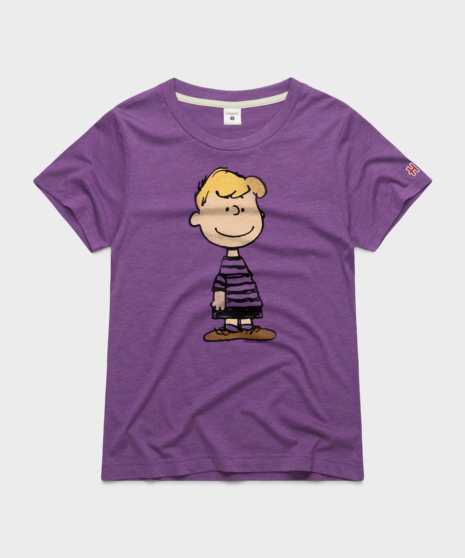 Royal purple women's t-shirt featuring Schroeder playing his toy piano on the front chest