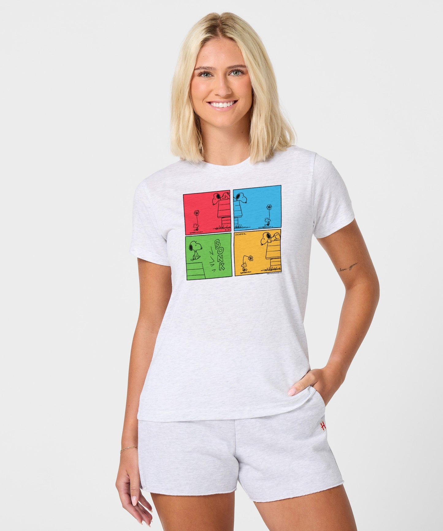 Back view of the ash grey t-shirt, showing a plain solid back and comfortable fit