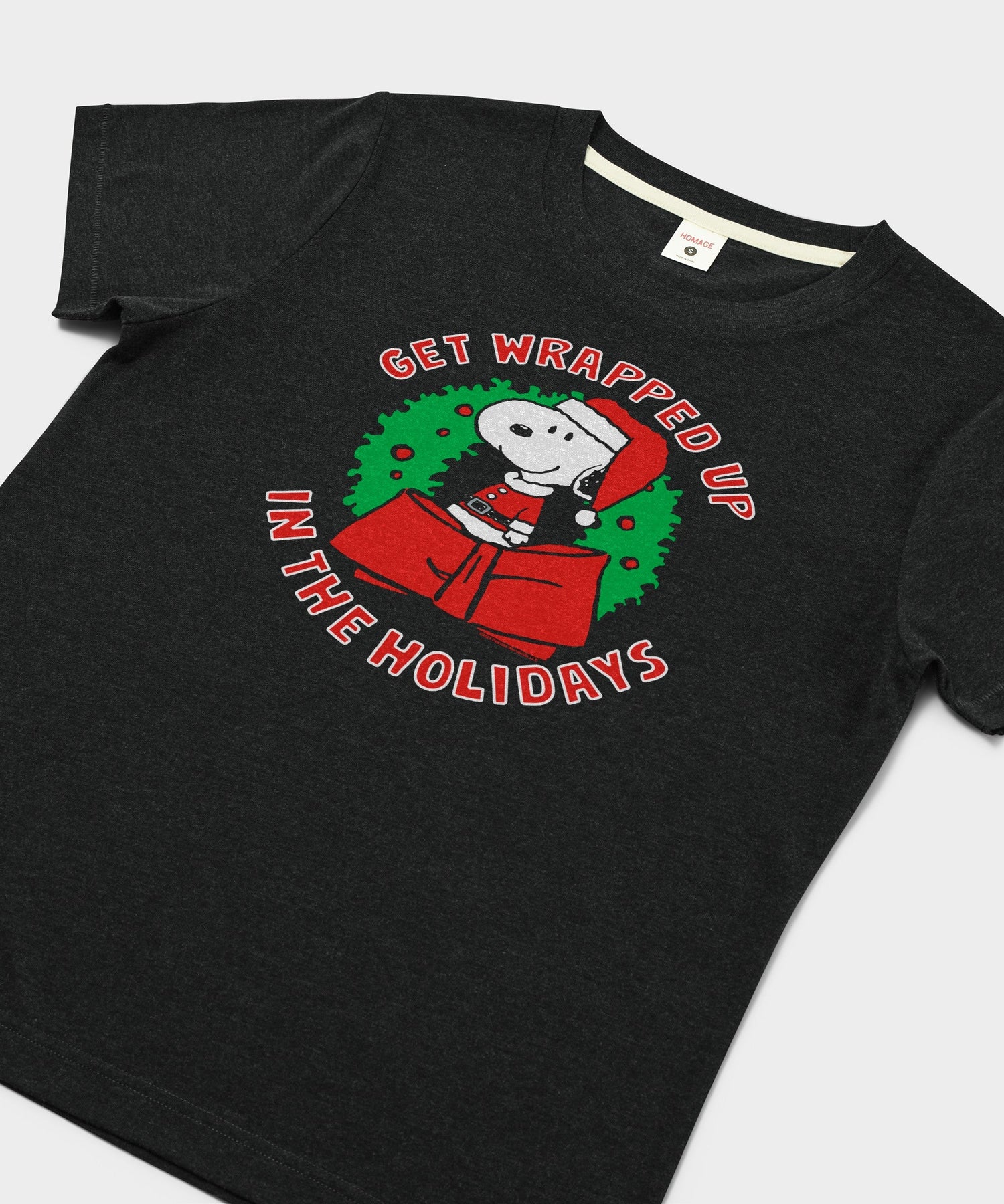 Close-up of the Snoopy holiday graphic printed on the charcoal fabric