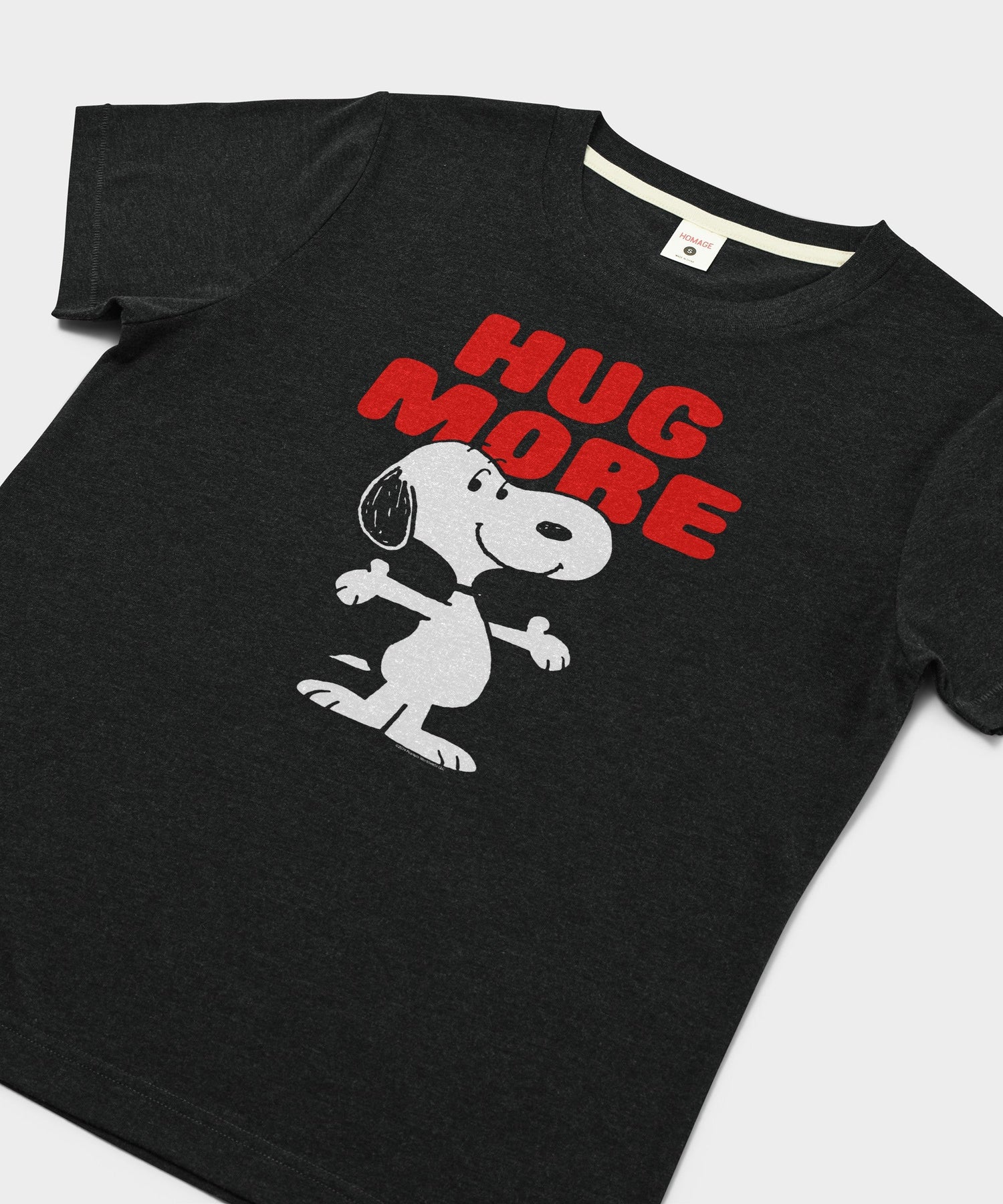 Close-up of the Snoopy and Woodstock Hug More graphic on the charcoal t-shirt