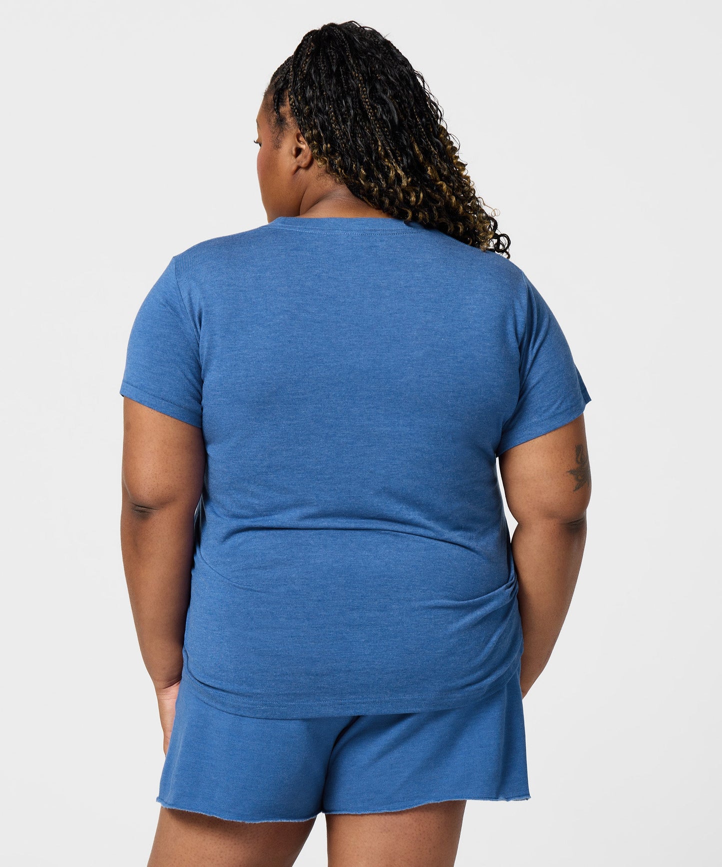 Back view of the solid royal blue t-shirt with a clean, plain finish