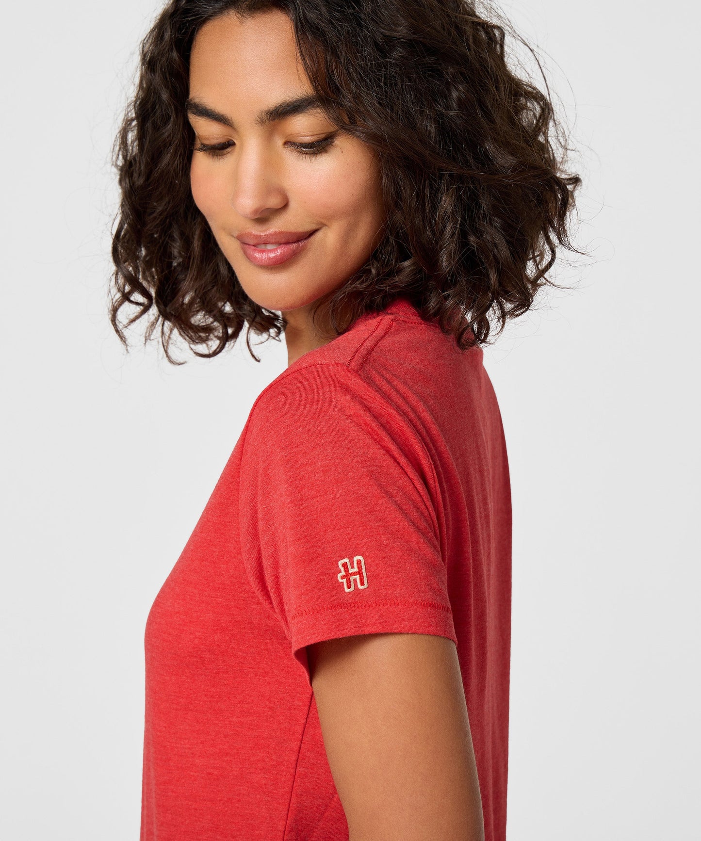 Folded red t-shirt showing the complete Snoopy national parks graphic design