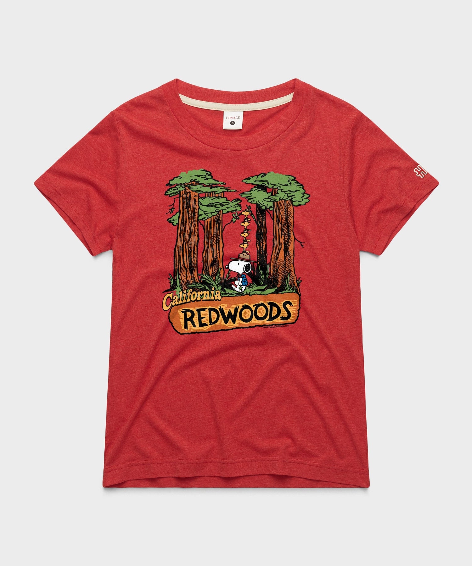 Red women's t-shirt featuring Snoopy exploring the California Redwoods on the front chest