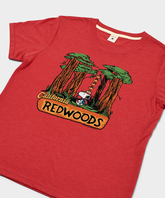 Red women's t-shirt featuring Snoopy exploring the California Redwoods on the front chest-1