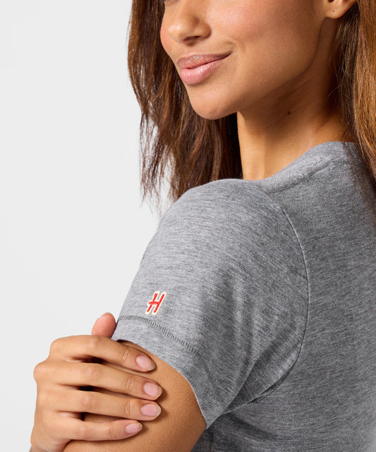 Grey women's t-shirt with a graphic of Snoopy exploring Glacier National Park on the chest-4