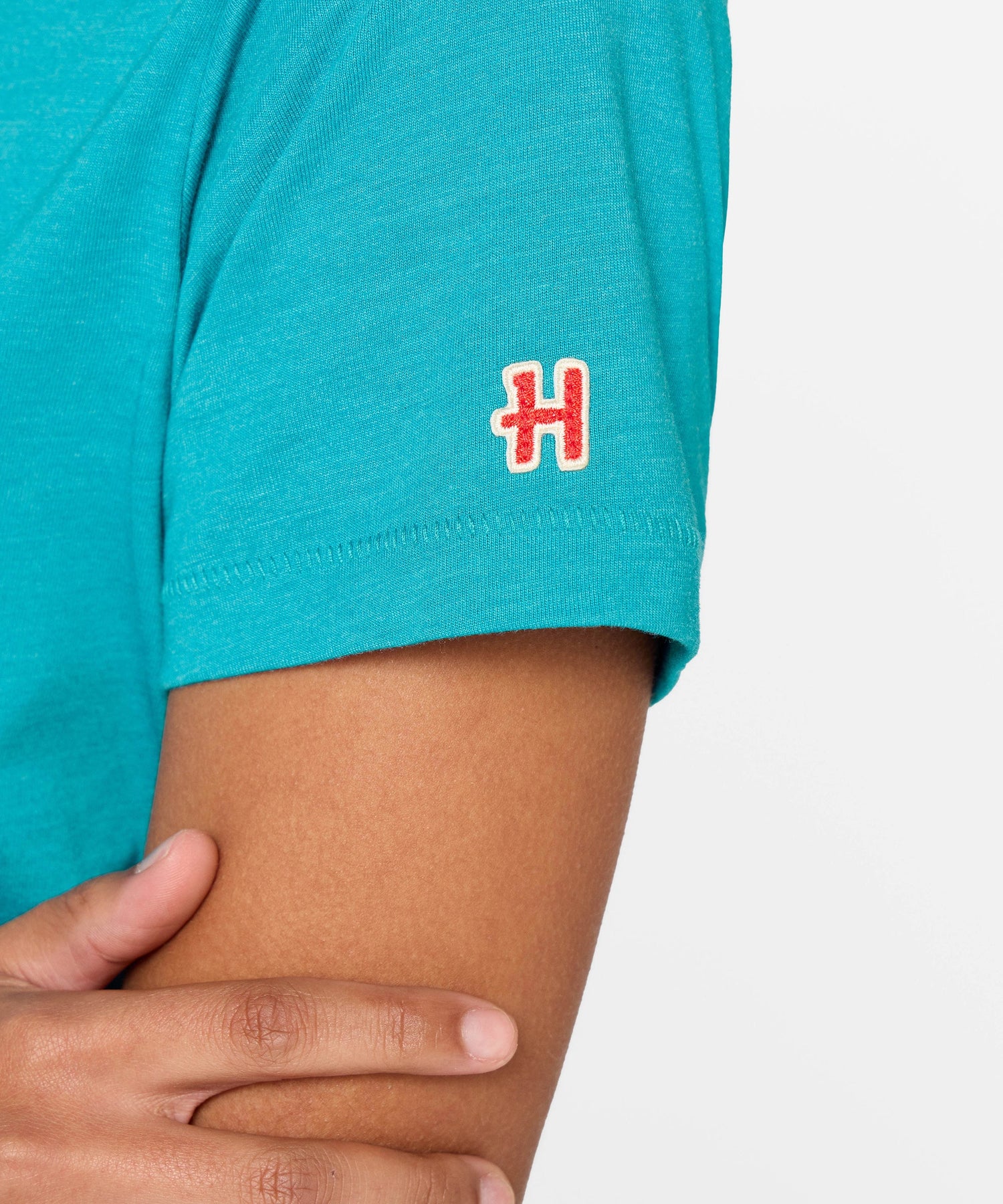 Close-up of the soft fabric texture in teal