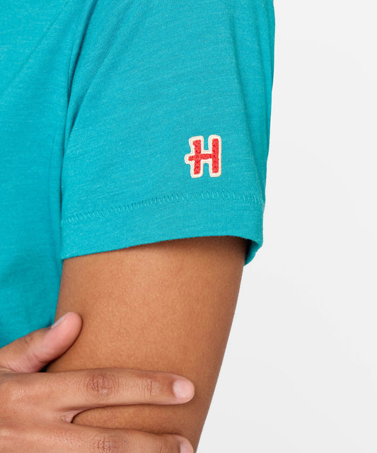 Teal women's t-shirt featuring a graphic of Snoopy in Joshua Tree National Park on the front chest-4