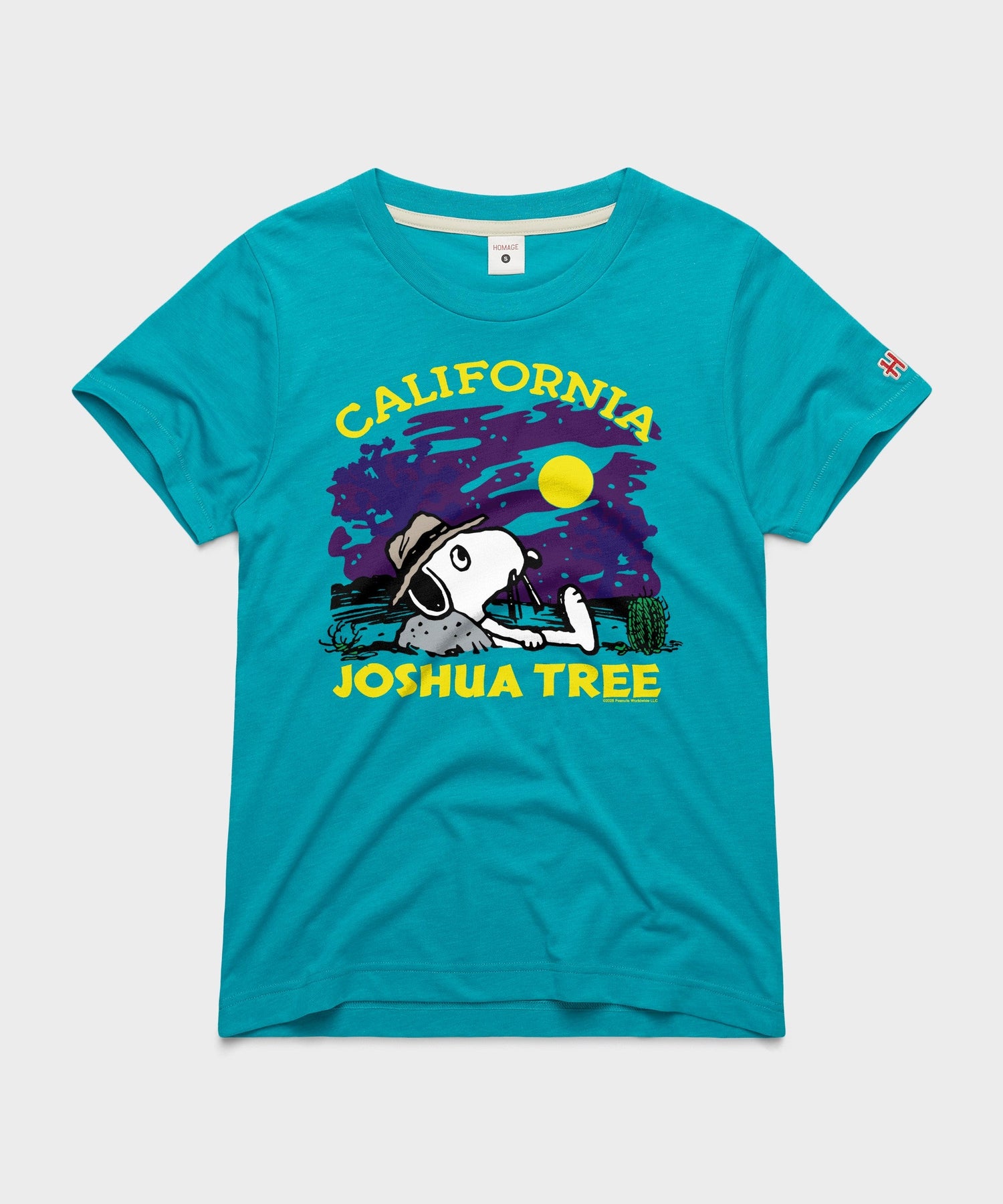 Teal women's t-shirt featuring a graphic of Snoopy in Joshua Tree National Park on the front chest