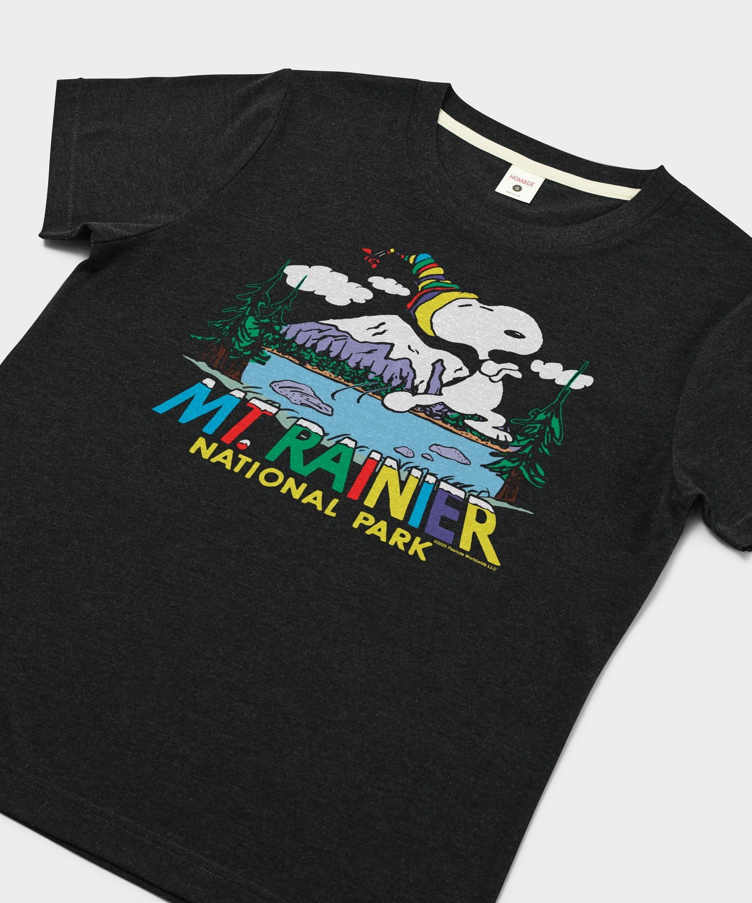 Close-up of the graphic print showing Snoopy enjoying the mountain landscape