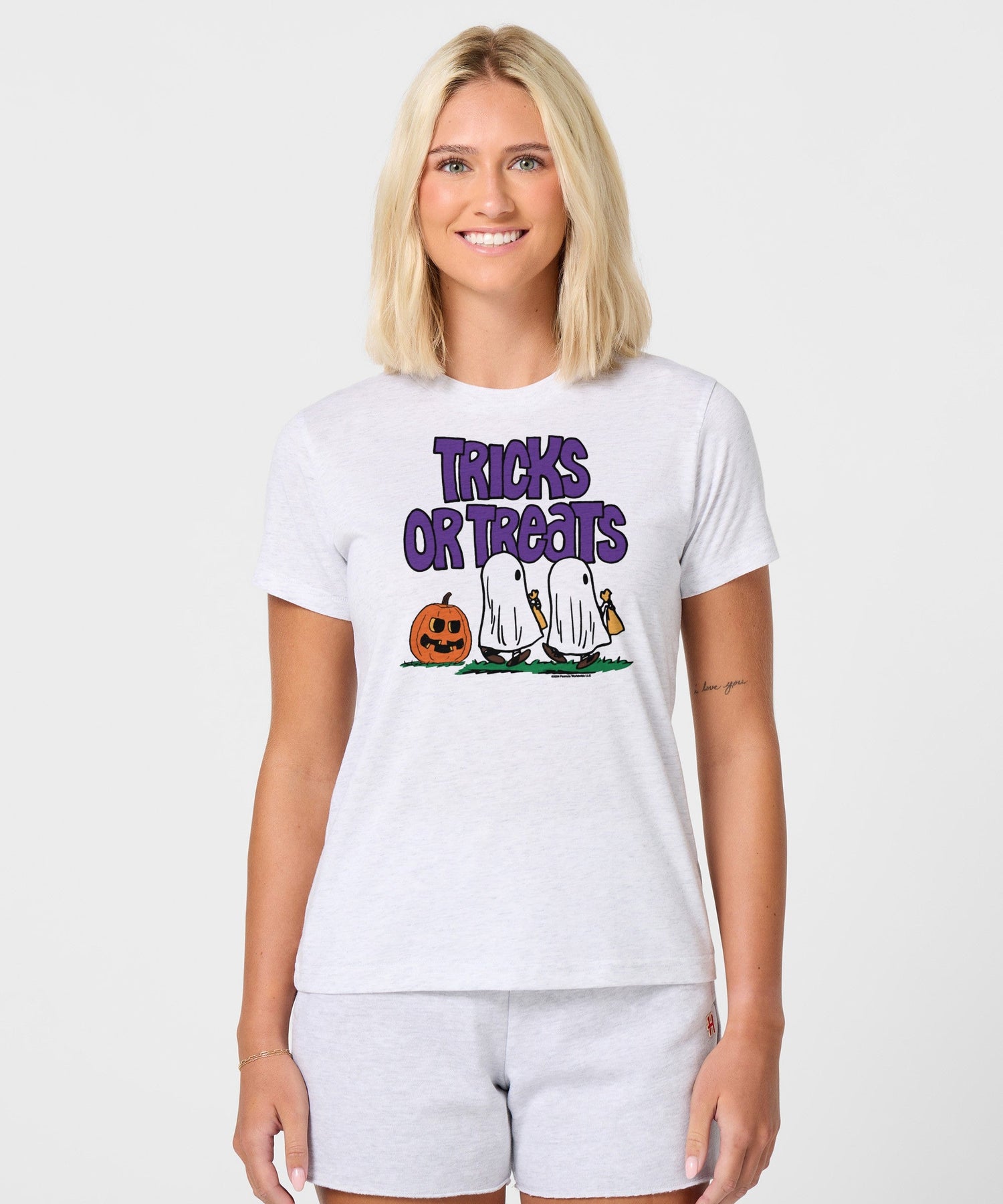 Side view of the women's classic fit Peanuts t-shirt