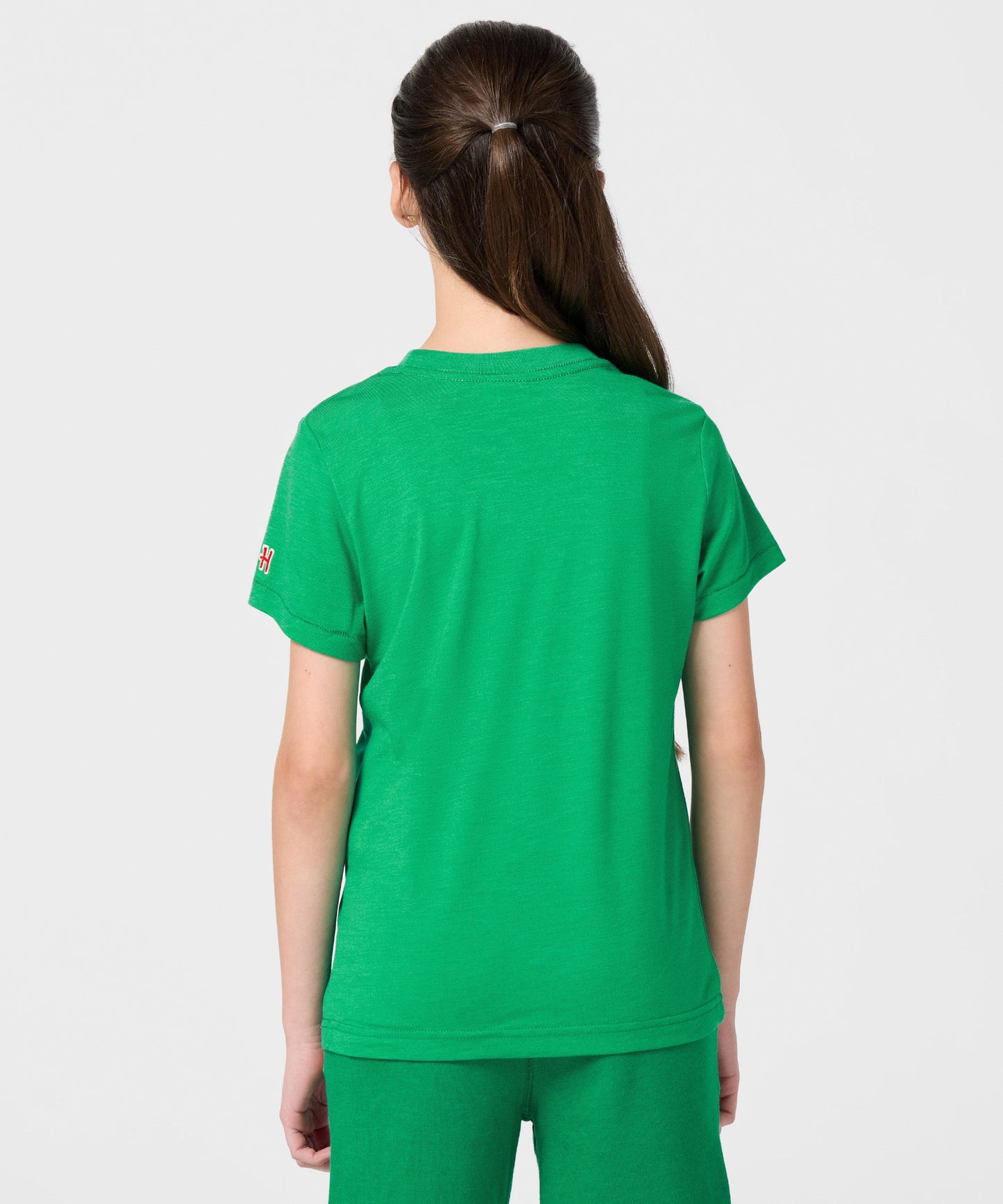 Close-up of the HOMAGE collaboration neck label inside the t-shirt