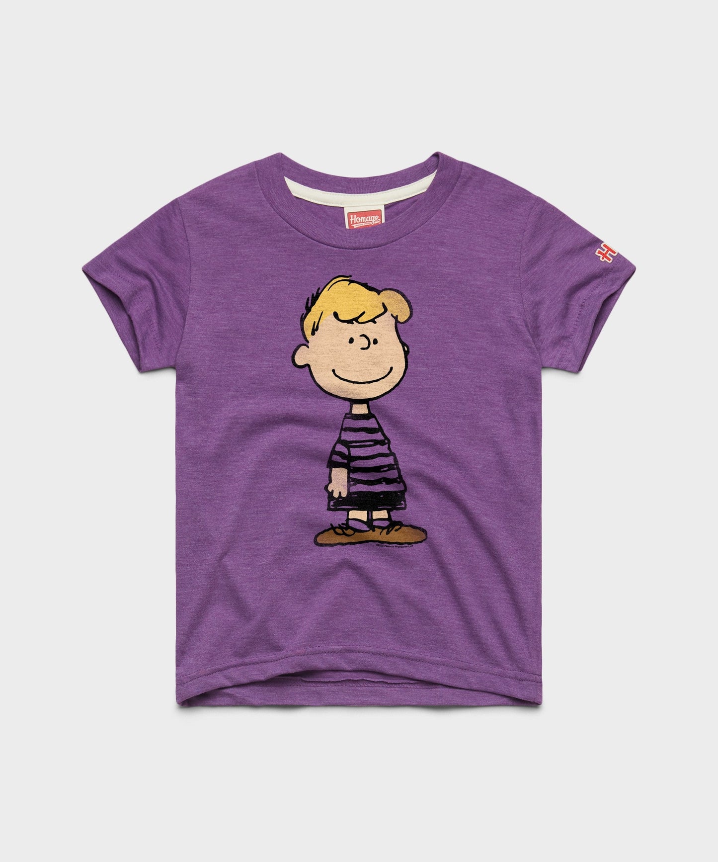 Youth t-shirt featuring Schroeder playing his piano on the front chest