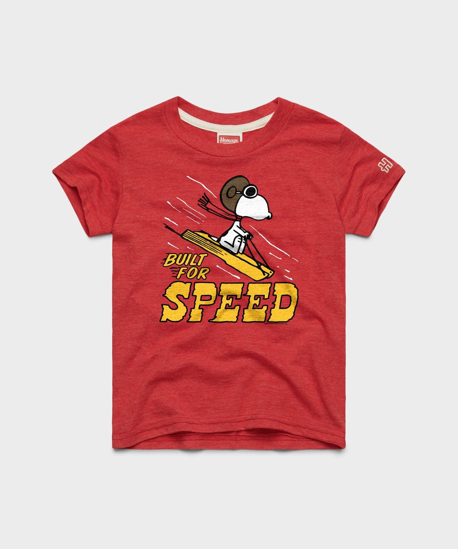 Bright red youth t-shirt with a vintage-style Snoopy Built For Speed graphic centered on the front