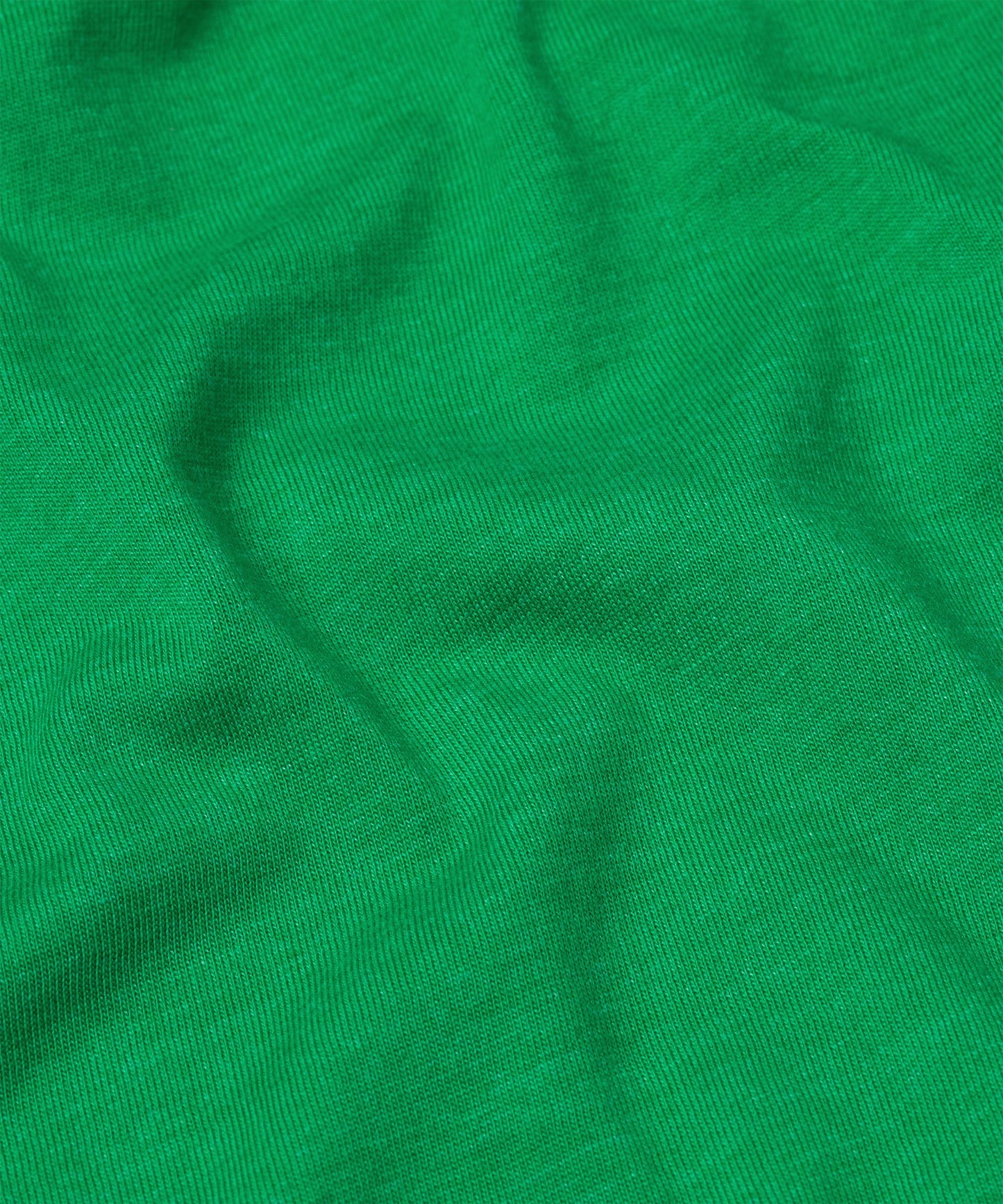 Detailed view of the soft fabric texture and interior collar branding