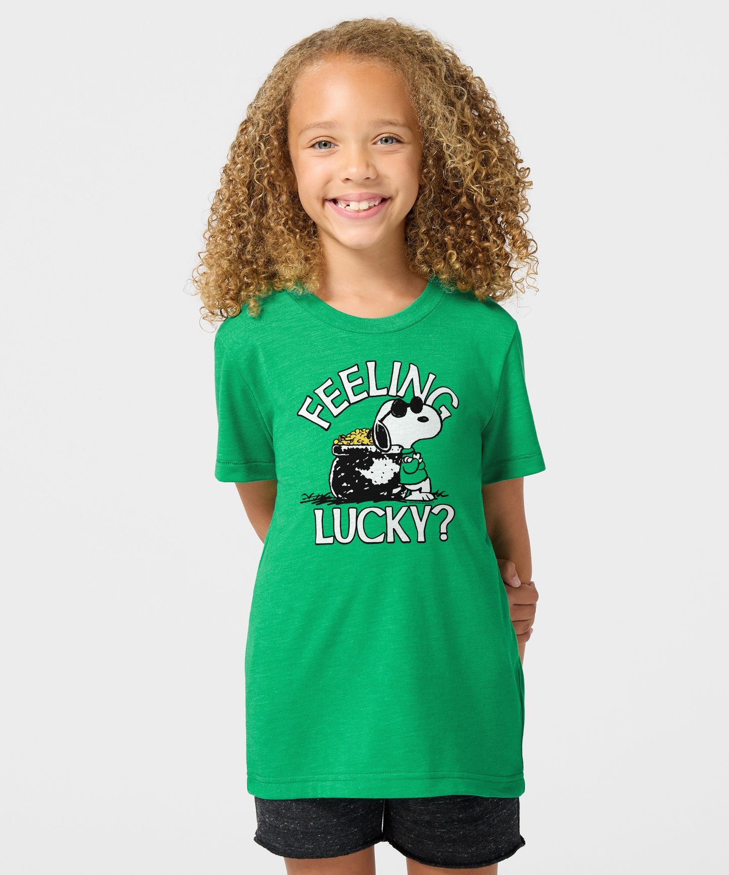 Back view of the solid green youth t-shirt with a clean, plain finish