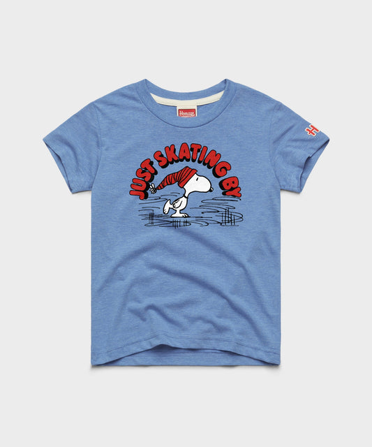 Light blue youth t-shirt featuring Snoopy skating across a frozen pond on the front chest-0